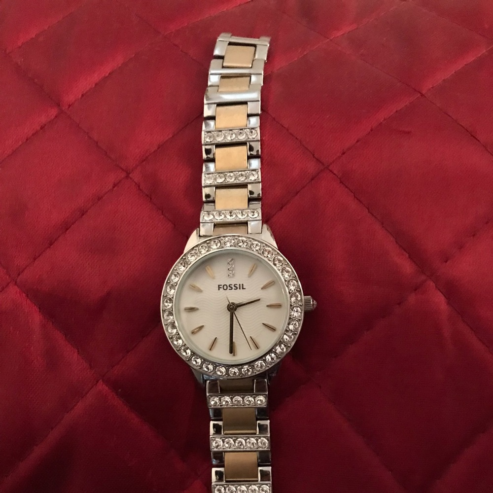 Fossil watch with crystals.